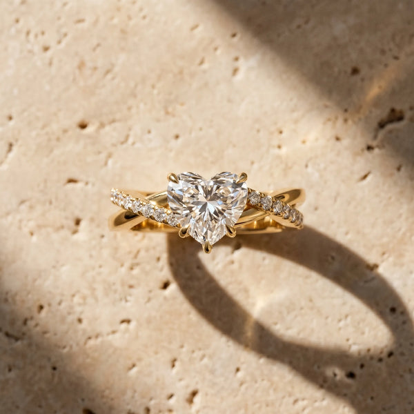 Yellow gold Heart Cut Diamond Twisted Band with Pavé Setting and Four-Prong Setting