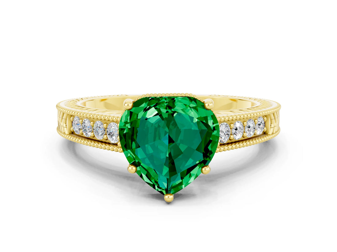 Yellow gold Heart Cut Emerald Engagement Ring with Milgrain Channel Set Band and Prong Setting