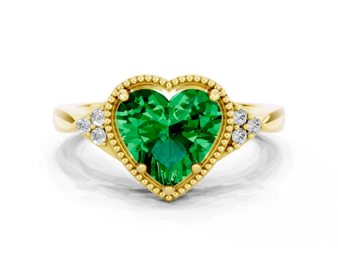 Yellow gold Heart Cut Emerald Halo Ring with Tapered Band and Four-Prong Setting