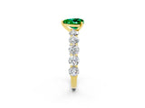 Yellow gold Heart Cut Emerald Prong Setting with Side Stones on a Pave Band_2