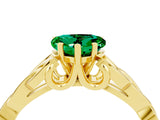 Yellow gold Heart Cut Emerald Solitaire Engagement Ring with Celtic Knot Band and Four-Prong Setting_4