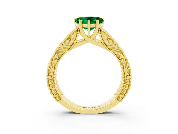 Yellow gold Heart Cut Emerald Solitaire Ring with Engraved Band and Four-Prong Setting