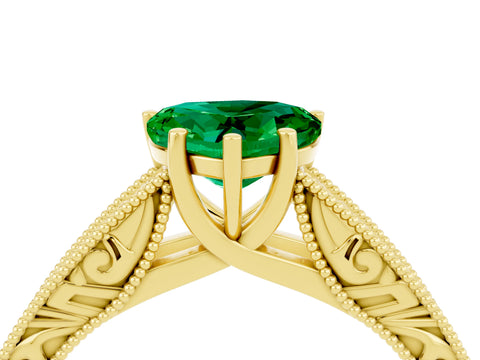 Yellow gold Heart Cut Emerald Solitaire Ring with Engraved Band and Four-Prong Setting_4