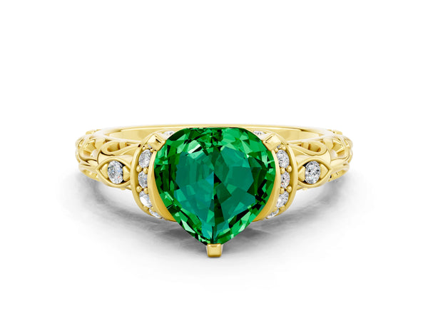 Yellow gold Heart Cut Emerald Solitaire Ring with Filigree Band and Four-Prong Setting