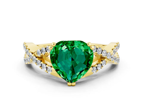 Yellow gold Heart Cut Emerald Solitaire Ring with Four-Prong Setting and Twisted Pavé Band
