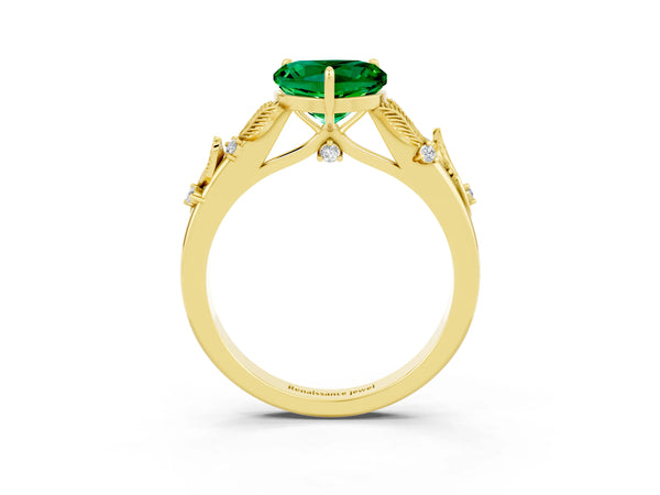 Yellow gold Heart Cut Emerald Solitaire Ring with Leaf Motif Band and Four-Prong Setting