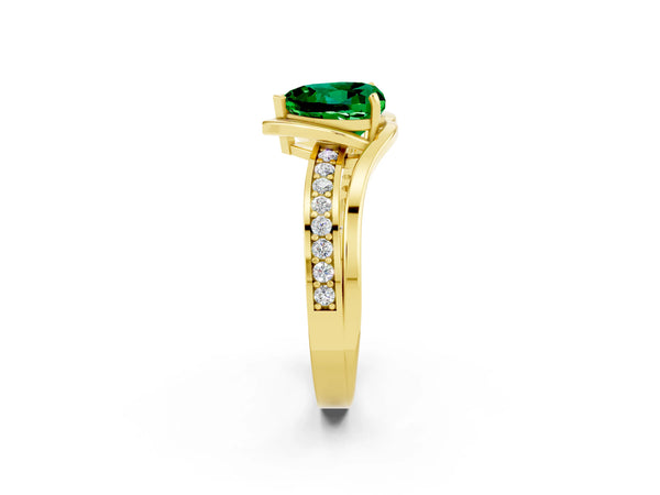 Yellow gold Heart Cut Emerald Solitaire Ring with Split Shank and Prong Setting