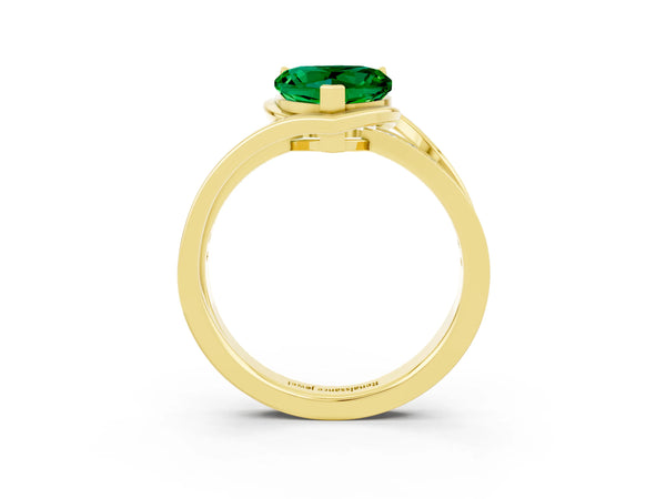 Yellow gold Heart Cut Emerald Solitaire Ring with Split Shank and Prong Setting