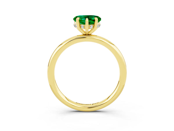 Yellow gold Heart Cut Emerald Solitaire Ring with Thin Band and Four-Prong Setting