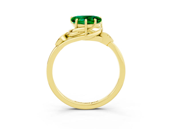 Yellow gold Heart Cut Emerald Solitaire Ring with Twist Band and Four-Prong Setting