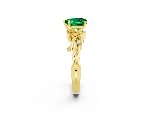 Yellow gold Heart Cut Emerald Solitaire Ring with Twisted Band and Prong Setting