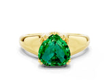 Yellow gold Heart Cut Emerald Solitaire Ring with Wide Band and Prong Setting