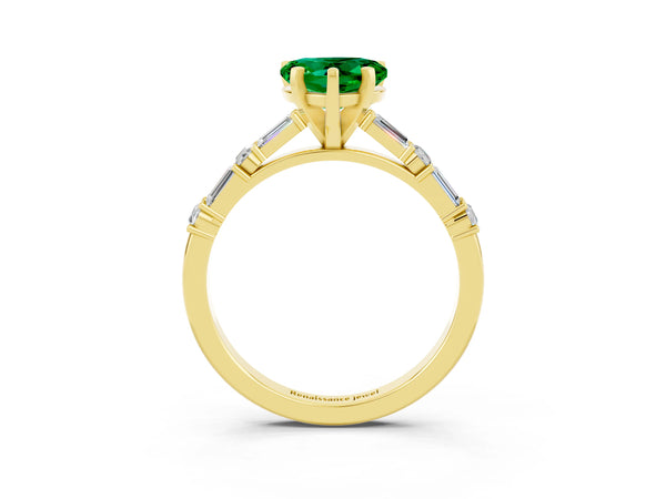 Yellow gold Heart Cut Emerald Solitaire with Side Baguettes and Channel Set Band