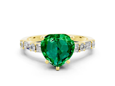 Yellow gold Heart Cut Emerald Solitaire with Side Baguettes and Channel Set Band