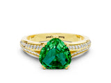 Yellow gold Heart Cut Emerald Split Shank Engagement Ring with Pavé Band