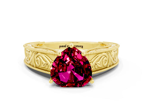 Yellow gold Heart Cut Garnet Solitaire Ring with Engraved Band and Four-Prong Setting