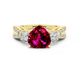 Yellow gold Heart Cut Garnet Three-Stone Ring with Pavé Split Shank and Four-Prong Setting