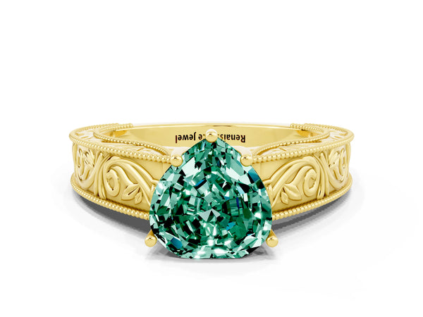 Yellow gold Heart Cut Green Sapphire Solitaire Ring with Engraved Band and Four-Prong Setting