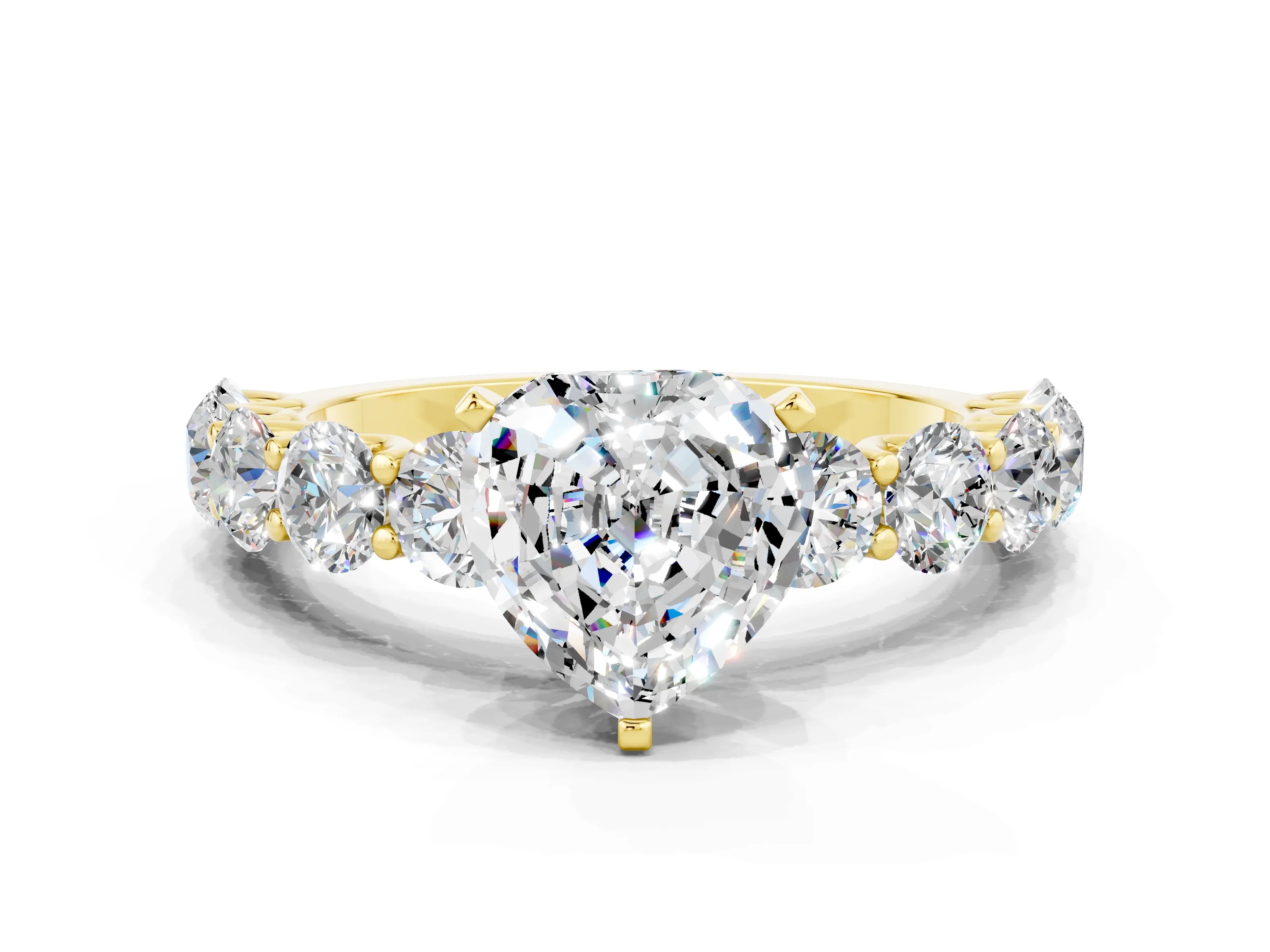 Yellow gold Heart Cut Moissanite Prong Setting with Side Stones on a Pave Band