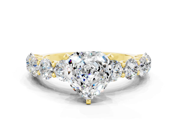 Yellow gold Heart Cut Moissanite Prong Setting with Side Stones on a Pave Band