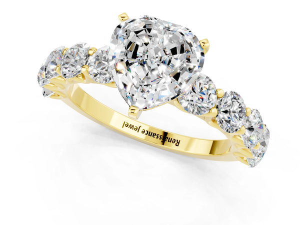 Yellow gold Heart Cut Moissanite Prong Setting with Side Stones on a Pave Band