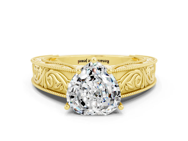 Yellow gold Heart Cut Moissanite Solitaire Ring with Engraved Band and Four-Prong Setting