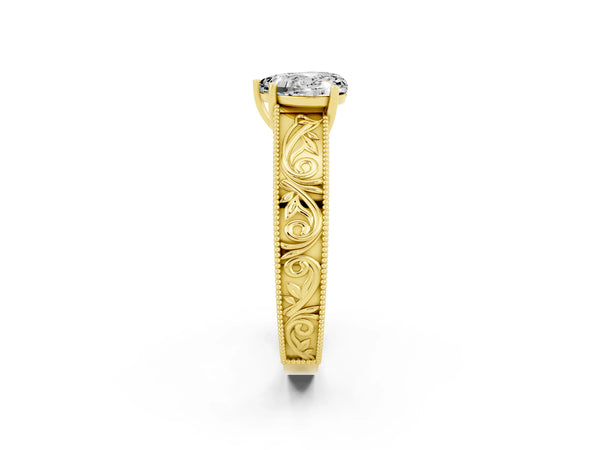 Yellow gold Heart Cut Moissanite Solitaire Ring with Engraved Band and Four-Prong Setting
