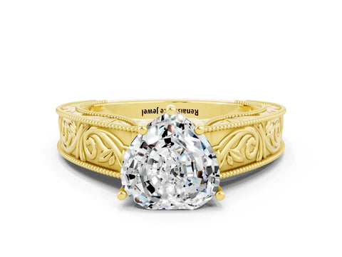 Yellow gold Heart Cut Moissanite Solitaire Ring with Engraved Band and Four-Prong Setting