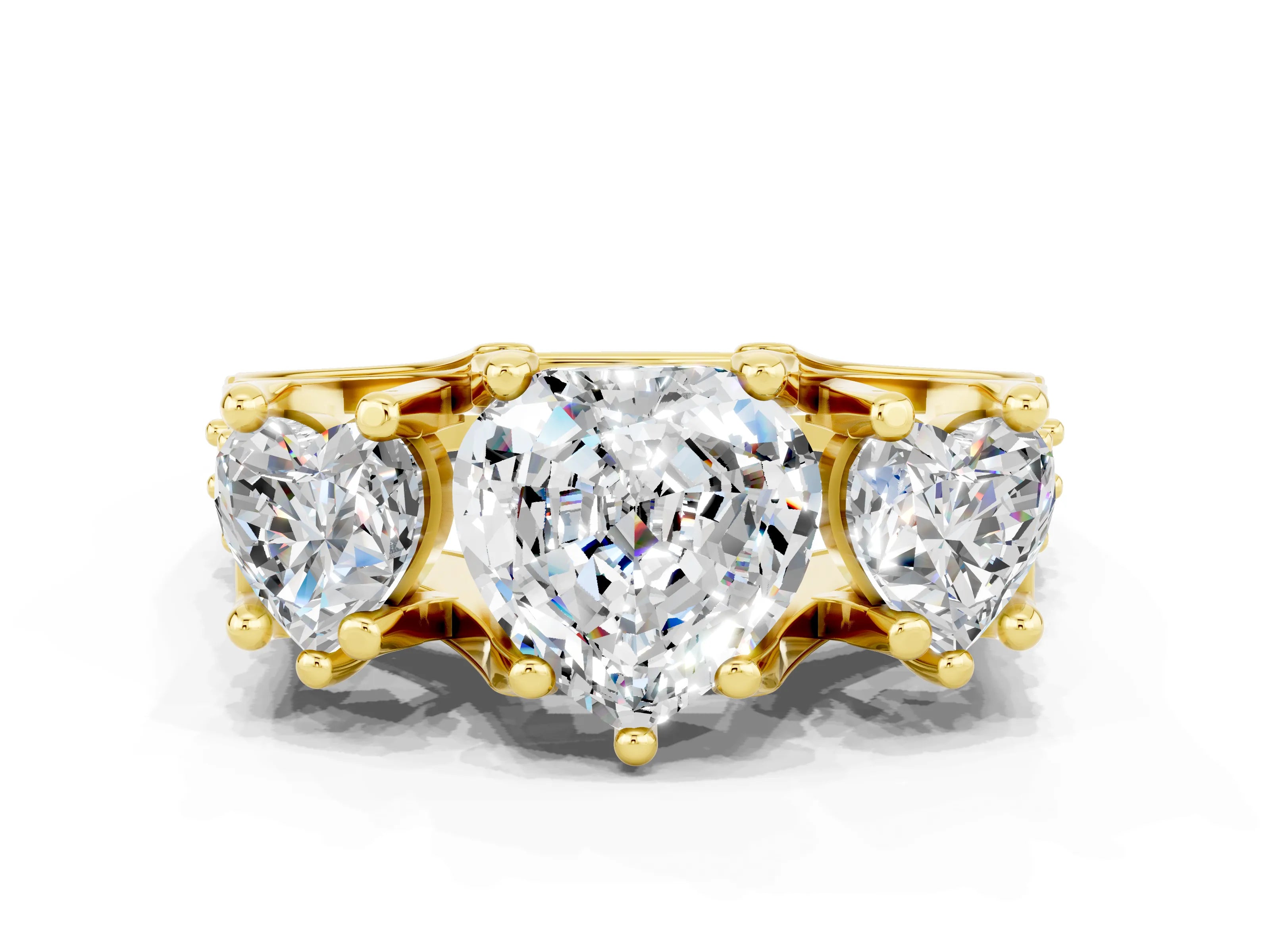 Yellow gold Heart Cut Moissanite Three-Stone Ring with Channel Set Band and Four-Prong Setting