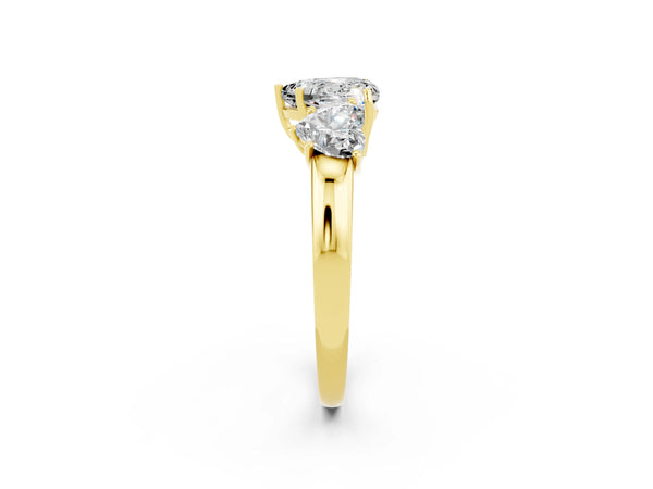 Yellow gold Heart Cut Moissanite Three-Stone Ring with Four-Prong Setting and Classic Band