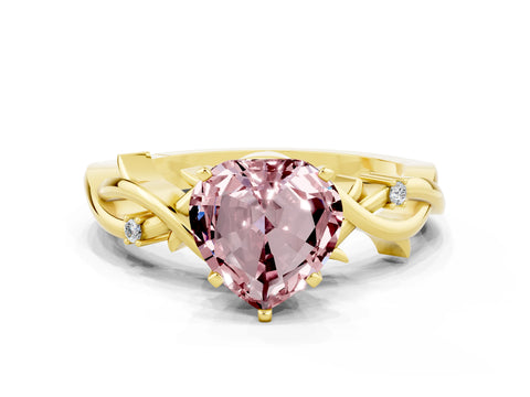 Yellow gold Heart Cut Morganite Solitaire Ring with Twisted Band and Prong Setting