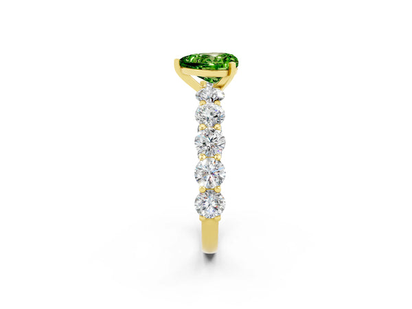 Yellow gold Heart Cut Peridot Prong Setting with Side Stones on a Pave Band