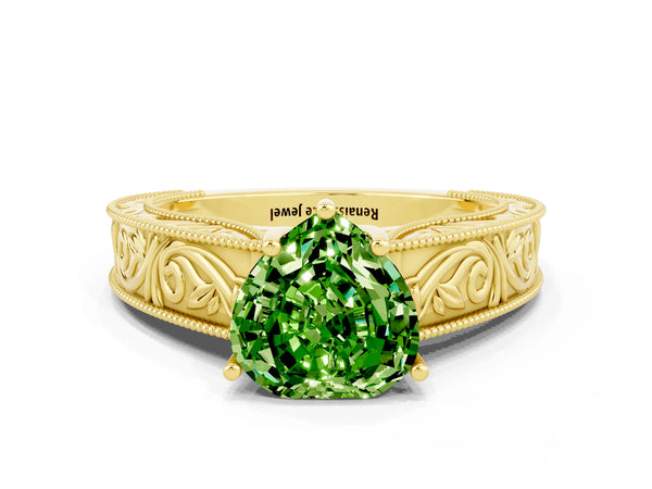 Yellow gold Heart Cut Peridot Solitaire Ring with Engraved Band and Four-Prong Setting