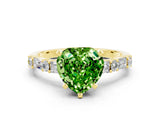 Yellow gold Heart Cut Peridot Solitaire with Side Baguettes and Channel Set Band