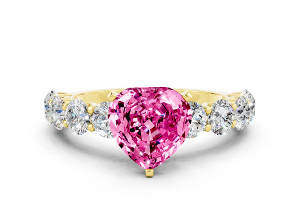 Yellow gold Heart Cut Pink Sapphire Prong Setting with Side Stones on a Pave Band