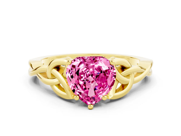 Yellow gold Heart Cut Pink Sapphire Solitaire Engagement Ring with Celtic Knot Band and Four-Prong Setting