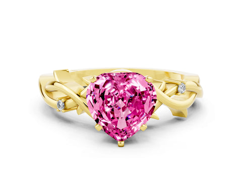 Yellow gold Heart Cut Pink Sapphire Solitaire Ring with Twisted Band and Prong Setting