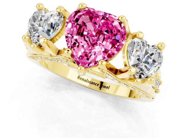Yellow gold Heart Cut Pink Sapphire Three-Stone Ring with Channel Set Band and Four-Prong Setting