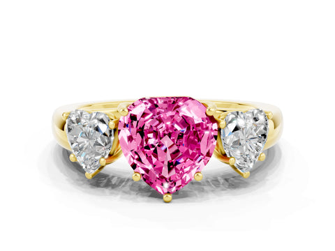 Yellow gold Heart Cut Pink Sapphire Three-Stone Ring with Four-Prong Setting and Classic Band