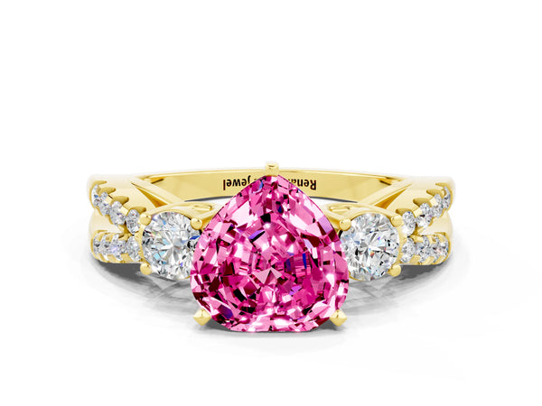 Yellow gold Heart Cut Pink Sapphire Three-Stone Ring with Pavé Split Shank and Four-Prong Setting