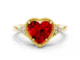 Yellow gold Heart Cut Ruby Halo Ring with Tapered Band and Four-Prong Setting