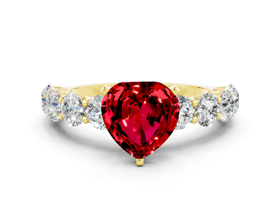 Yellow gold Heart Cut Ruby Prong Setting with Side Stones on a Pave Band