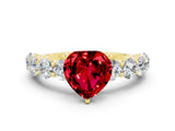Yellow gold Heart Cut Ruby Prong Setting with Side Stones on a Pave Band