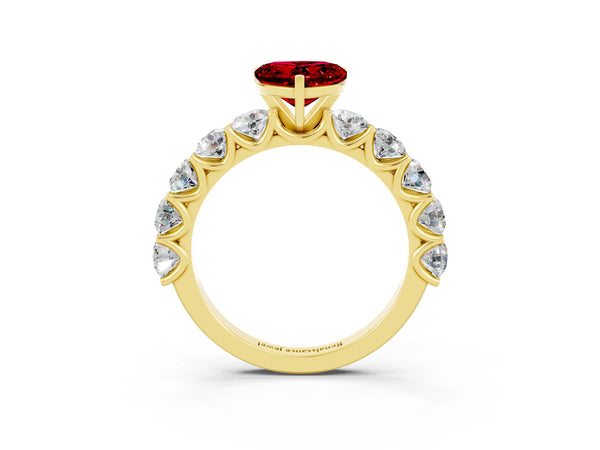 Yellow gold Heart Cut Ruby Prong Setting with Side Stones on a Pave Band