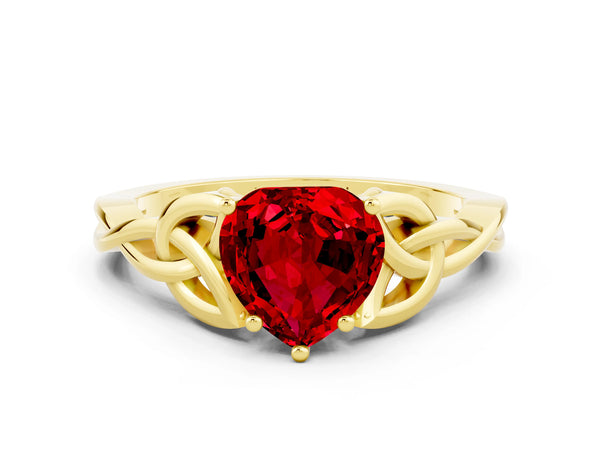 Yellow gold Heart Cut Ruby Solitaire Celtic Knot Ring with Four-Prong Setting