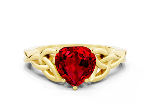 Yellow gold Heart Cut Ruby Solitaire Engagement Ring with Celtic Knot Band and Four-Prong Setting