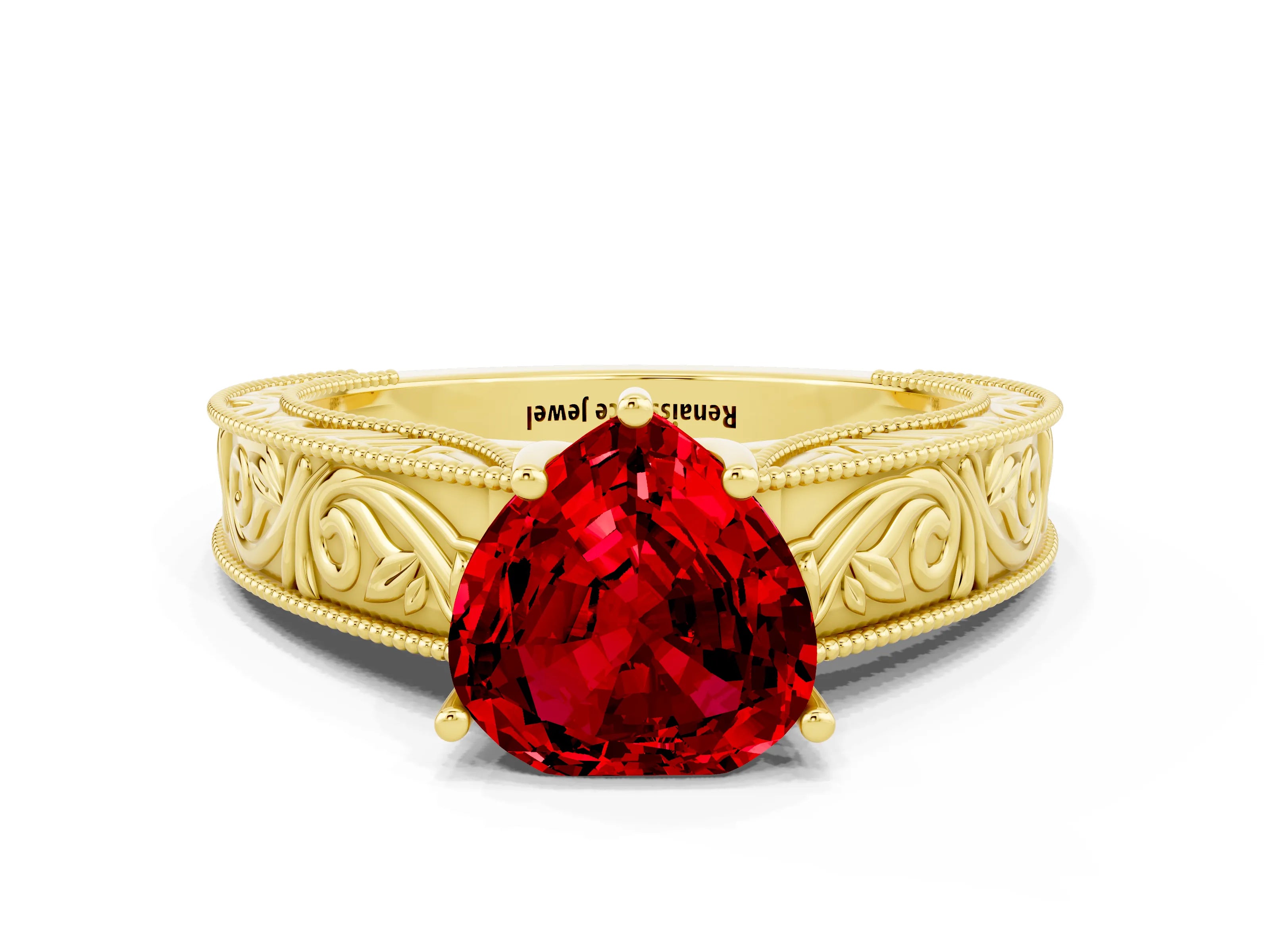 Yellow gold Heart Cut Ruby Solitaire Ring with Engraved Band and Four-Prong Setting