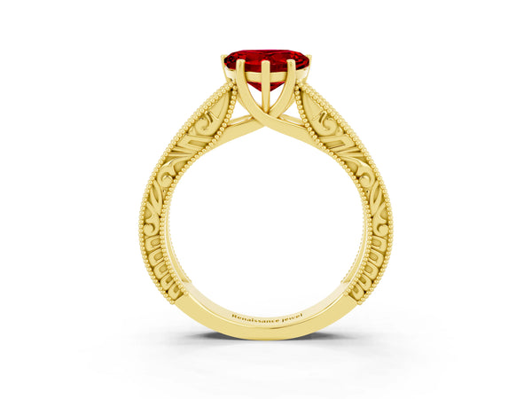 Yellow gold Heart Cut Ruby Solitaire Ring with Engraved Band and Four-Prong Setting