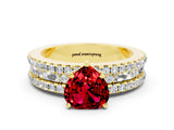 Yellow gold Heart Cut Ruby Solitaire Ring with Pavé and Channel Set Band
