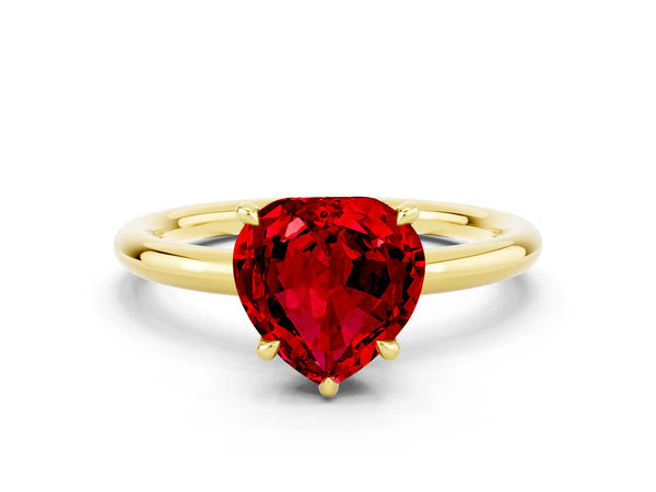 Yellow gold Heart Cut Ruby Solitaire Ring with Thin Band and Four-Prong Setting